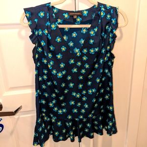 Laser cut flutter short sleeve floral top